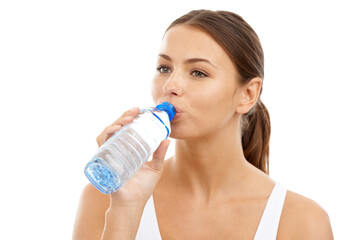 Fitness, woman or drinking water in studio for exercise break, energy or detox for healthy recovery on white background. Athlete, thinking and bottle of liquid for hydration, nutrition or sports diet