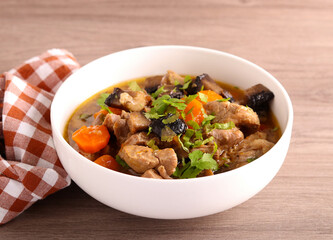 Meat and mushroom stew with carrot