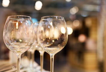 Wine glasses on the shelf closeup, houseware store