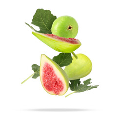Ripe figs and green leaves falling on white background