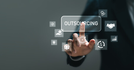 Outsourcing global Recruitment HR Business finance concept. Businessman touching outsourcing icon on virtual screen.