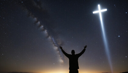 silhouette of worshipper with arms raised under Christian cross symbol.