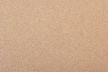 Fototapeta na wymiar Brown paper texture background. Beige kraft paper texture