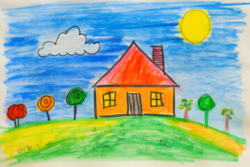 А child 's drawing of a house and a sunny sky