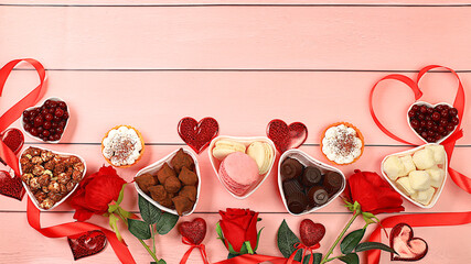 Gourmet heart shaped chocolate candies, sugar cranberry, meringue and rose flowers, food for...