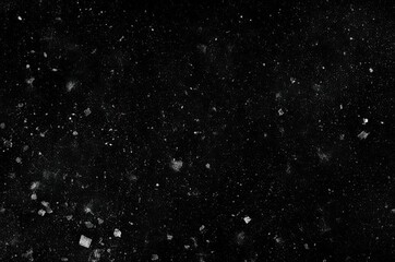 Dust and scratches on a black background.