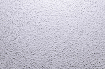 Textured white wall background with copy space for text