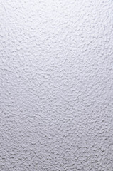 Textured white wall background with copy space for text