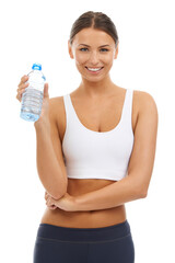 Portrait, exercise or woman with water in studio for fitness, energy or detox for healthy training on white background. Happy athlete drinking bottle of liquid for hydration, nutrition or sports diet