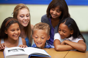 School teacher, education and reading book with students, classroom and knowledge or learning....
