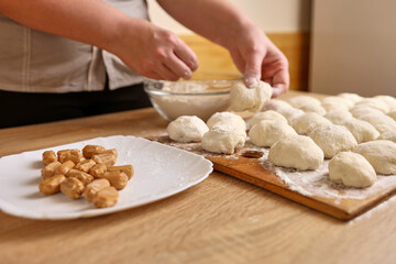 To make donuts, toffee is added to the dough. The process of making donuts