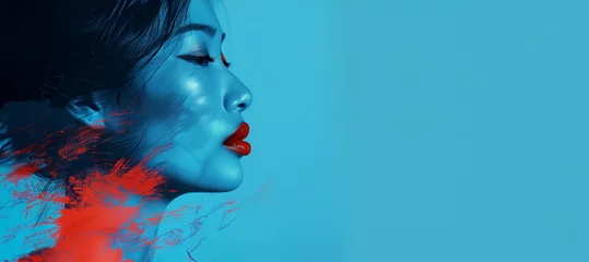 Foto op Plexiglas Beautiful Chinese young woman with bright red lips side profile face view on bright blue background. Feminine beauty, fashion, glamour and cosmetology concept © Alex Tihonov