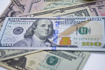 one hundred dollar banknotes, dollars background, cash money, market, bills