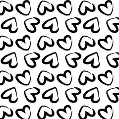 Heart seamless pattern. Black and white ink brush hearts hand drawn ornament. Romantic figures vector illustration. Monochrome freehand dry paint brush stroke shapes.