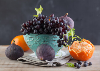 Beautiful fruit composition on wooden background. Colorful organic food set