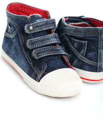 Two jeans sport shoes of a child
