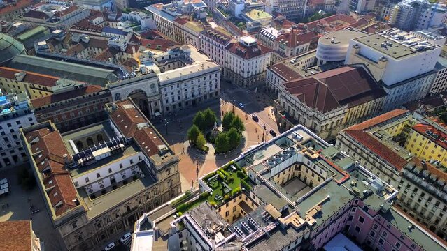 Aerial view of the Old Square with a monument to the artist and inventor Leonardo da Vinci next to the La Scala opera house theatre. Vittorio Emmanuele gallery in Milan Italy 2024