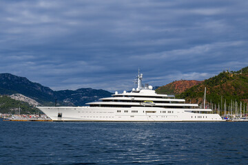 Luxury super yacht moored alongside in marina. Motor yacht. Large mega yacht. Yachting concept.