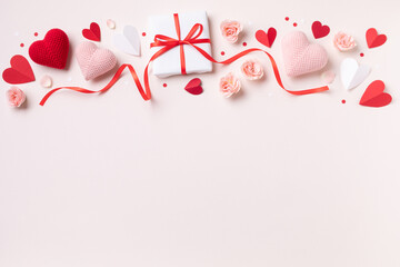 Valentine day or mother day festive composition with gift or present box, rose flowers and red pink...