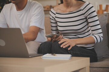 Asian business people discussing team of young asian entrepreneurs discussing business, Asia business team meeting discussion talking.