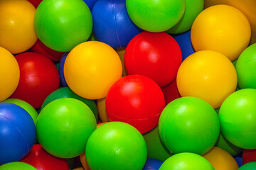 Fototapeta na wymiar Multi-colored small balls close-up