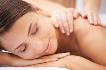 Woman, hands of masseuse and shoulder massage at spa, aromatherapy and healing with wellness. Calm,...