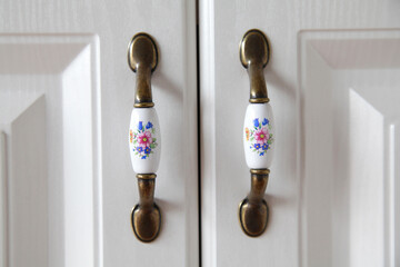 Small decorative kitchen cupboard handles, small rustic style handles, clean white furniture...