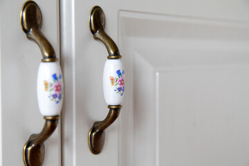 Small decorative kitchen cupboard handles, small rustic style handles, clean white furniture...