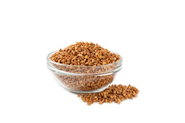 Raw buckwheat in a bowl isolated on white background.Wheat grains, porridge, cereals, raw buckwheat in a plate. Healthy food. Porridge. Diet. Organic cerea. Space for text.Copy space.