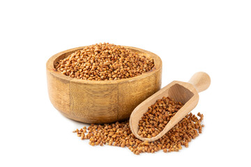 Raw buckwheat in a bowl isolated on white background.Wheat grains, porridge, cereals, raw buckwheat in a plate. Healthy food. Porridge. Diet. Organic cerea. Space for text.Copy space.