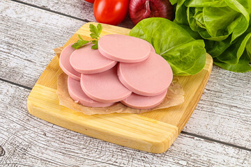 Slices boiled sausages for breakfast