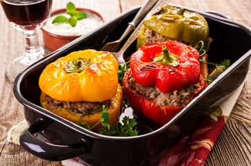 Traditional German stuffed bell peppers with minced meat served as close-up on a classic design...