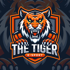 The angry tiger esport logo design Mascot vector illustration © Twenty One Studio
