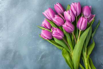 Background with a bouquet of pink tulips and an empty space for text.