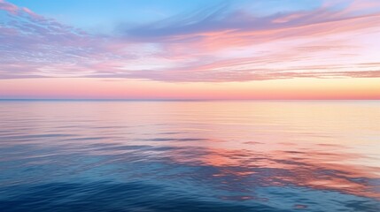 Tranquil ocean sunrise casting reflections on the calm water