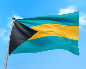 Bahamas flag fluttering in the wind on sky.