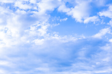 Beautiful blue sky and white fluffy group of clouds background in the morning skyline