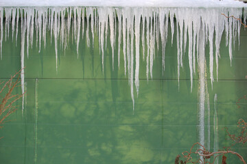 icecles hanging from a roof