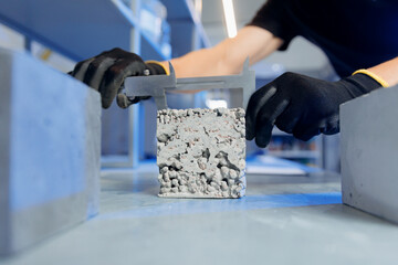Check size and controls quality of concrete cube in laboratory. Concept industry lab for testing...
