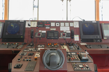 Ship's control device. Engine control from navigational bridge. Focused on helm, blured background. © Alexey Seafarer
