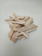 Ice cream sticks are made of light brown wood