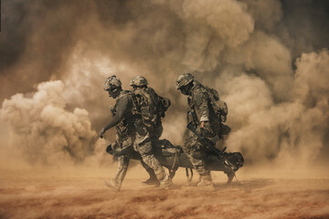 Army Soldiers carrying patient to the aircraft between smoke in the battle field	