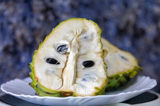 Ripe atemoya fruit isolated in selective focus (Annona &times; atemoya)