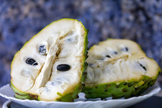 Ripe atemoya fruit isolated in selective focus (Annona &times; atemoya)