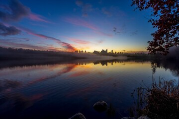 Deer Lake, Burnaby with lingering for approaching sunset with orange and magenta clouds
