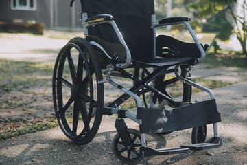 Fototapeta na wymiar Single wheelchair parked in hospital hallway