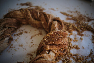 Preparing cruffin with nuts. Baking kraffin. Cook big cinnamon cruffin. Cinnamon bun. Cinnamon roll. Sweet dough.