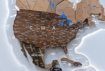 Wooden map of the world Central and South America, names of countries in Russian. Map for trip planning.