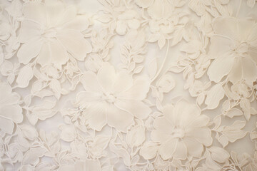 Intricate lace fabric texture with delicate floral patterns