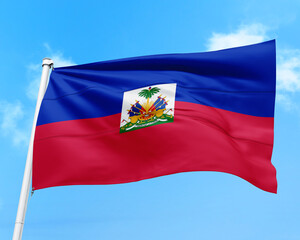 Haiti flag fluttering in the wind on sky.